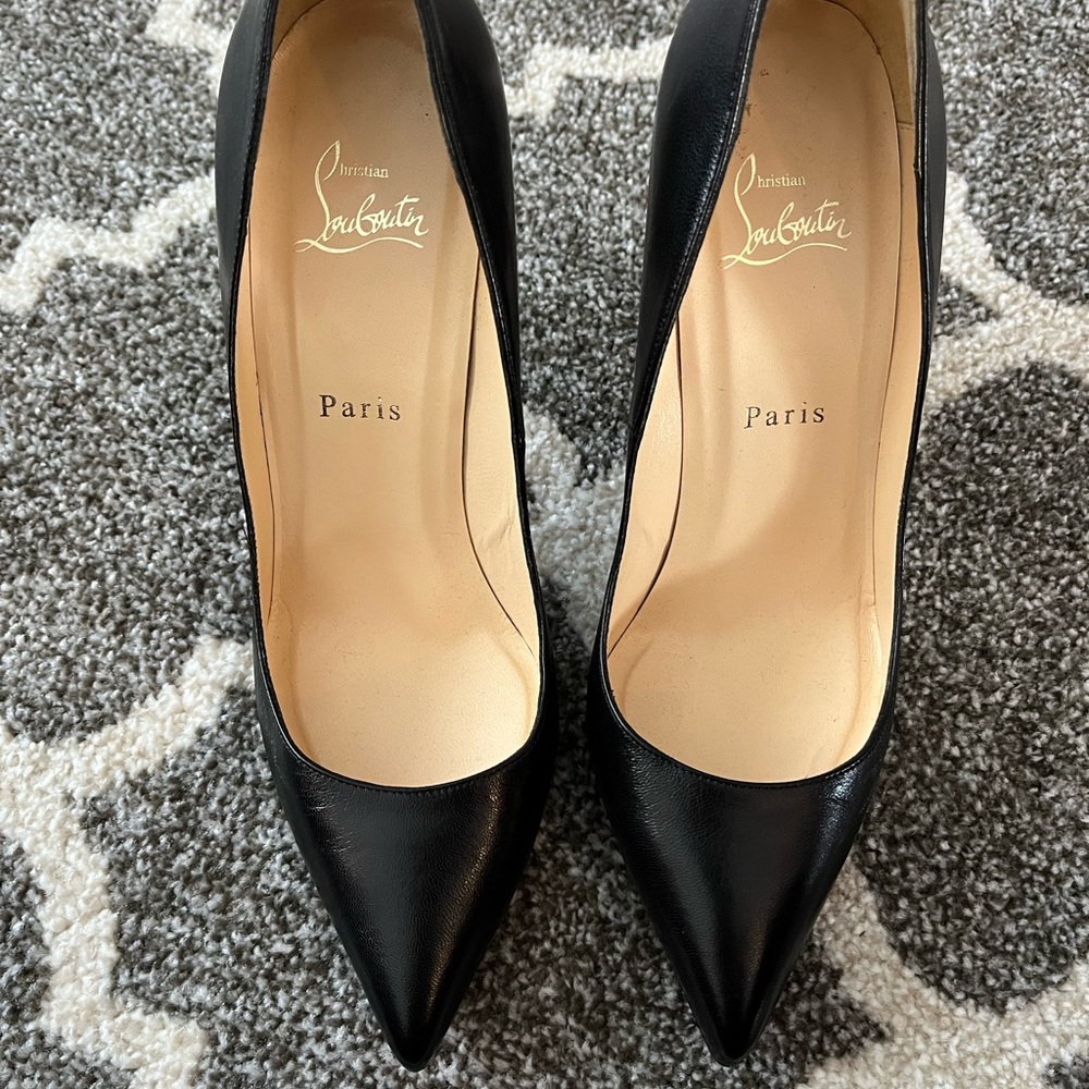 Christan Louboutin Heels. Black paten leather red bottoms